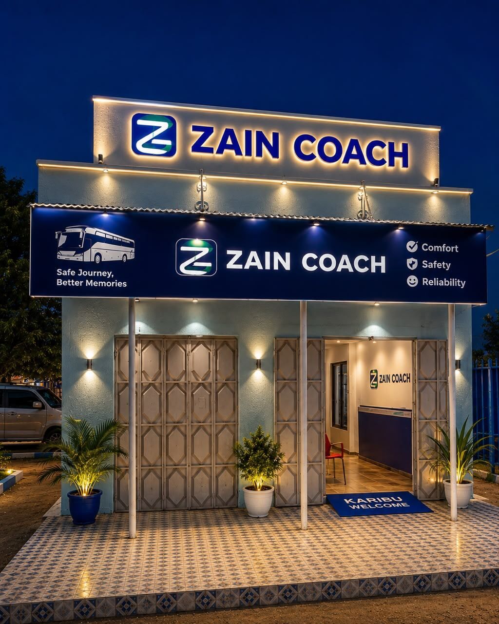 Zain Coach booking office lit up at night